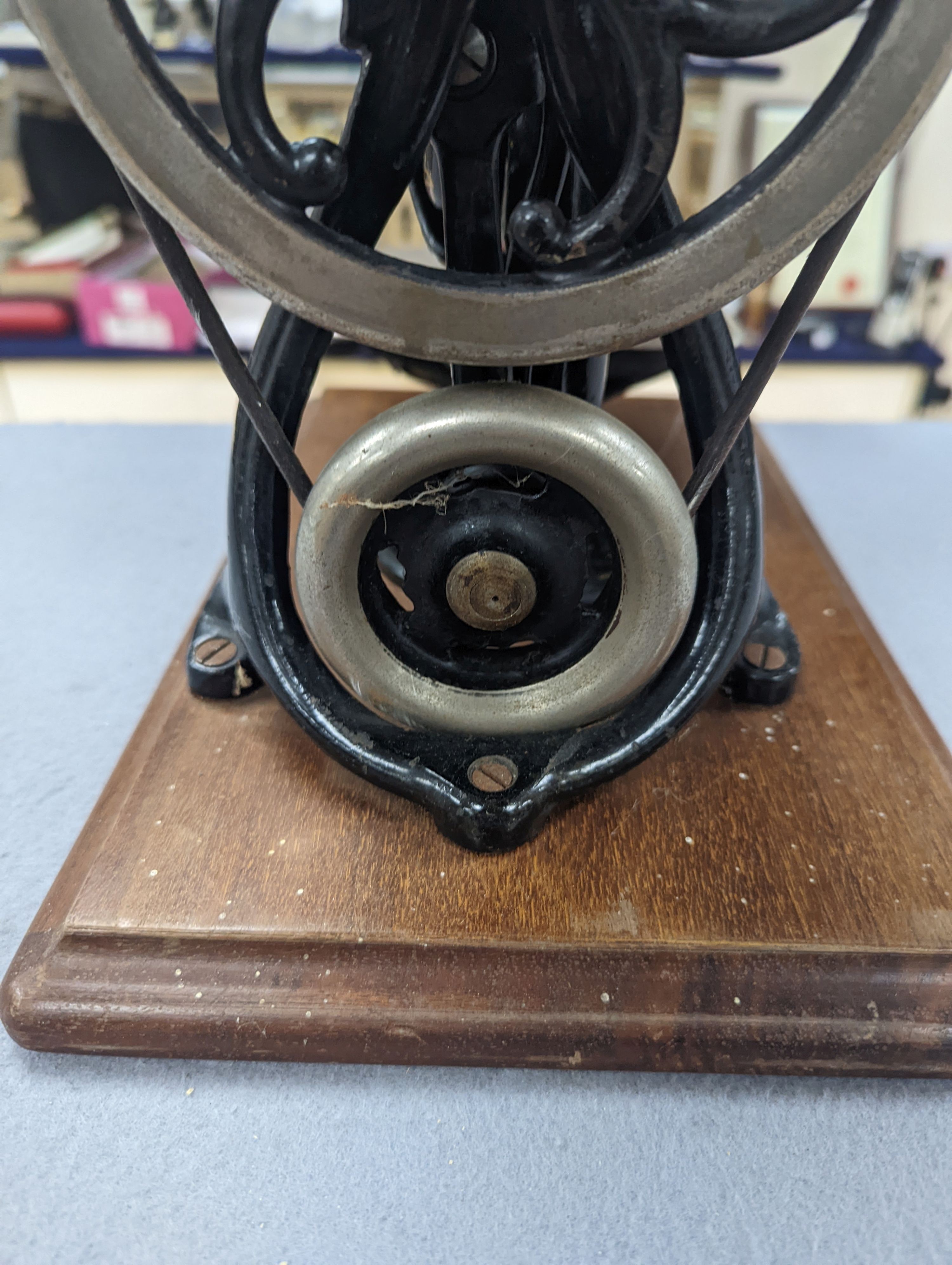 A Victorian sewing machine, Corona typewriter and two microscopes